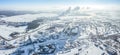 Industrial district in winter. factory buildings, warehouses and thermal power plant on a cold winter day. aerial Royalty Free Stock Photo