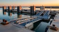 Industrial dockside facility at sunset waterfront Royalty Free Stock Photo
