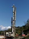 Industrial drilling rig machinery on highway construction site. Viaduct construction and bridge pillar details Royalty Free Stock Photo