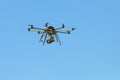 Industrial drone on a background of blue sky