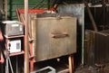 Industrial electric furnace for hardening metal parts. Old and dirty electric furnace for hardening metal parts