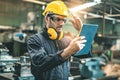 Industrial Engineers in Hard Hats.Work at the Heavy Industry Manufacturing Factory.industrial worker indoors in factory. man Royalty Free Stock Photo