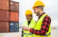 Industrial engineers working in logistic terminal of container cargo