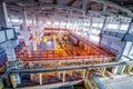 Industrial equipment at the factory in large production hall