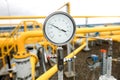 Industrial equipment pipes, manometer/pressure gauge, levers, faucets, indicators in a natural gas compressor station
