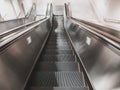 Industrial Escalator down to undeground subway station. Can be seen in urban area or capital city. Royalty Free Stock Photo