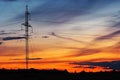 High voltage transmission power lines at sunset