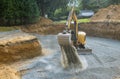 Industrial excavator for foundation building construction site, bucket details, dirt gravel Royalty Free Stock Photo