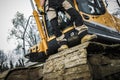 Excavator Operator and His Heavy Duty Industrial Machine Royalty Free Stock Photo