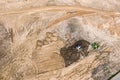 Industrial excavator working on construction site. aerial top view Royalty Free Stock Photo