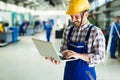 Industrial factory employee working in metal manufacturing industry Royalty Free Stock Photo