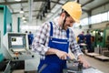 Industrial factory employee working in metal manufacturing industry Royalty Free Stock Photo