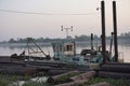 Industrial factory ground, construction plant, waterfront, with machinery, tools and material piled up Royalty Free Stock Photo