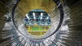 Industrial factory scene through the steel coil Royalty Free Stock Photo