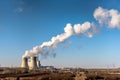 Industrial factory smoke stack of coal power plant from chimney up on sky cause air pollution and destroy the Earth`s atmosphere Royalty Free Stock Photo