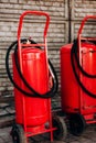 Industrial fire extinguisher red large barrel wheels