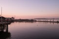 Industrial fishing dock in Bandon, Oregon with lots of seagulls flying around. Royalty Free Stock Photo