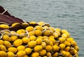 Industrial fishing net with yellow thingys