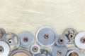 Industrial gear cogwheels on scratched brass metal surface Royalty Free Stock Photo