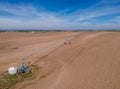 Industrial Grade Field Sprinkler in Fresh Dirt Field