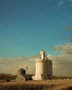Industrial grain elevator seen from wheat farm in the Palouse Washington state Royalty Free Stock Photo