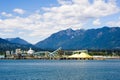 Industrial harbor facilities near mountains Royalty Free Stock Photo