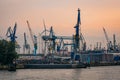 Industrial Harbor Hamburg in sunset Royalty Free Stock Photo