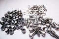 Industrial hardware set with socket head screws, nylon lock nuts, and spring washers Royalty Free Stock Photo