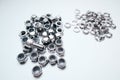Industrial hardware set with socket head screws, nylon lock nuts, and spring washers Royalty Free Stock Photo