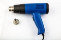 Industrial heat gun. Hot air gun with tips. Isolated on a white background Royalty Free Stock Photo