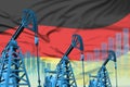 Industrial illustration of oil wells - Germany oil industry concept on flag background. 3D Illustration