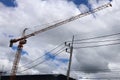 Industrial industrial construction cranes getting ready to work. Royalty Free Stock Photo