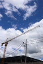 Industrial industrial construction cranes getting ready to work. Royalty Free Stock Photo