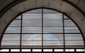 Industrial interior with big windows and shutters Royalty Free Stock Photo