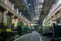 Industrial interior of heavy machinery workshop, large hall with machines, tools for metalwork, manufacturing production