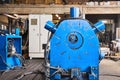 Industrial interior with long lathe with steady rest in the foreground Royalty Free Stock Photo