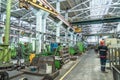 Industrial interior of metalworking factory. Workshop with many machine tools for metal processing, grinding, drilling