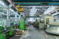 Industrial interior of metalworking factory. Workshop with many machine tools for metal processing, grinding, drilling