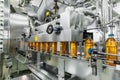 Industrial interior of natural juice plant production. Conveyor belt, filled bottles on beverage factory, industry Royalty Free Stock Photo