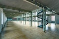 Industrial interior with round stairs