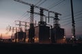 Industrial landscape with high voltage power lines at sunset. Electric substation with power lines and transformer, AI Generated Royalty Free Stock Photo