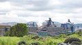 Industrial landscape with industry polluting the environment in GijÃ³n Royalty Free Stock Photo