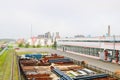 Industrial landscape. Panoramic view of technological pipes. Rusty pipes, blue rubies, production communications. Repair buildings Royalty Free Stock Photo