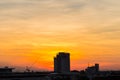 Industrial landscape with silhouettes of cranes Royalty Free Stock Photo