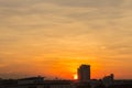 Industrial landscape with silhouettes of cranes Royalty Free Stock Photo