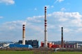 Industrial landscape. Thermal power plant with smoking from high chimneys. Ecological danger