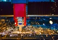 Industrial laser cut machine while cutting the sheet metal with the sparking light Royalty Free Stock Photo