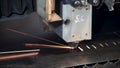 Industrial laser cutter. Clip. Machine for slitting, cutting and stripping steel sheet