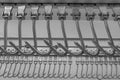 Industrial loading dock area inside cold storage warehouse. Meat hanging hooks hanging on the rail system