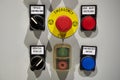 Industrial machine control panel with buttons and signals. center alarm button emergency, stop, side shift, overload, aktive